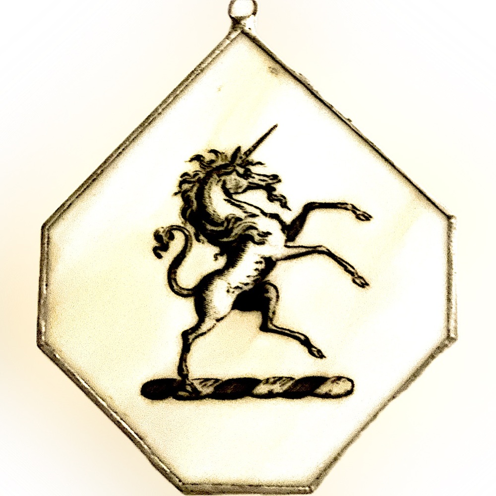 Unique Unicorn ornament wrapped with silver metal